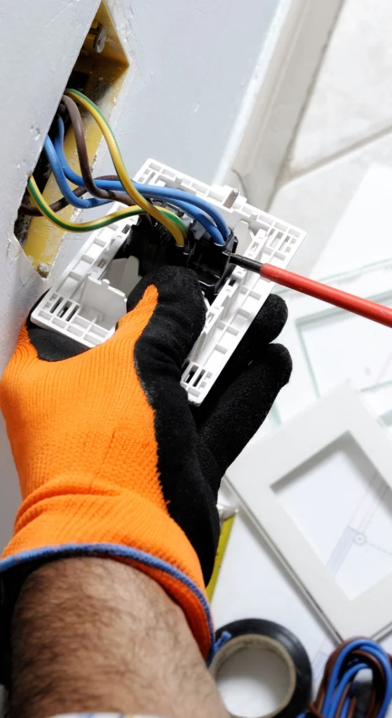 top view of an electrician doing an installation whitefish mt